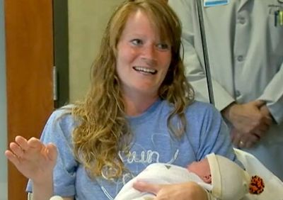 Беременная американка начала рожать на финише 42-километрового марафона