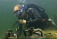 Видео: Владимир Путин в акваланге нашел клад на двухметровой глубине